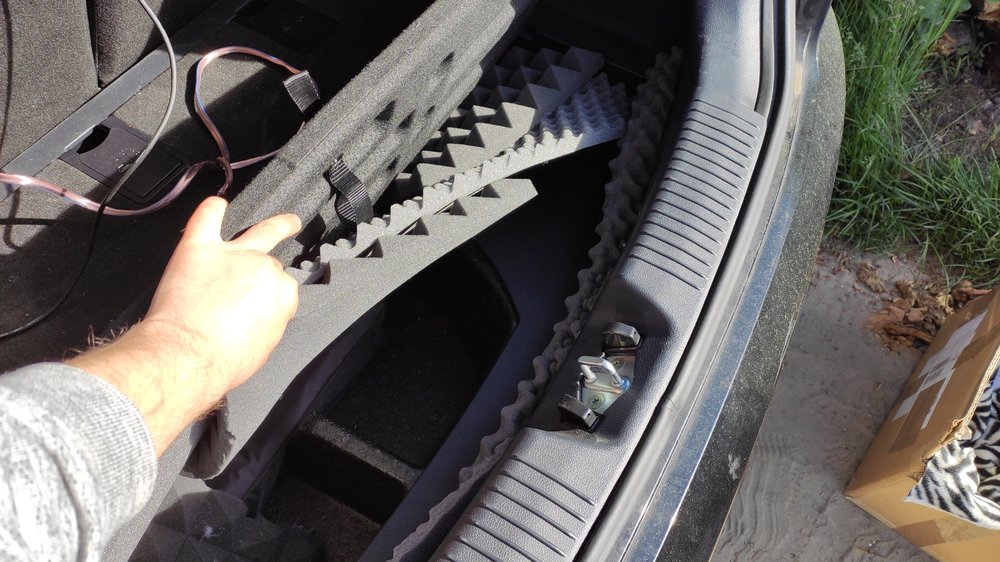 trunk under carpet hole.jpg